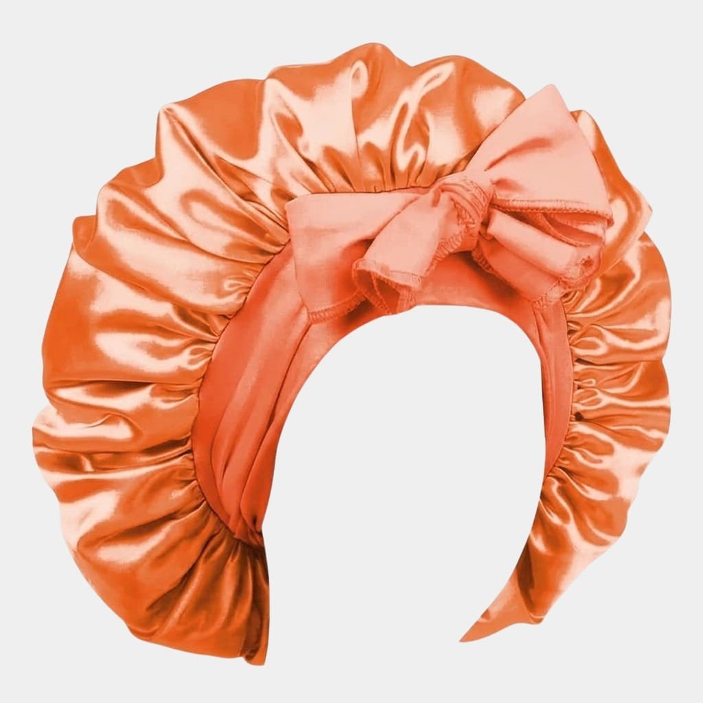 Bonnet de nuit en satin orange avec nœud ajustable