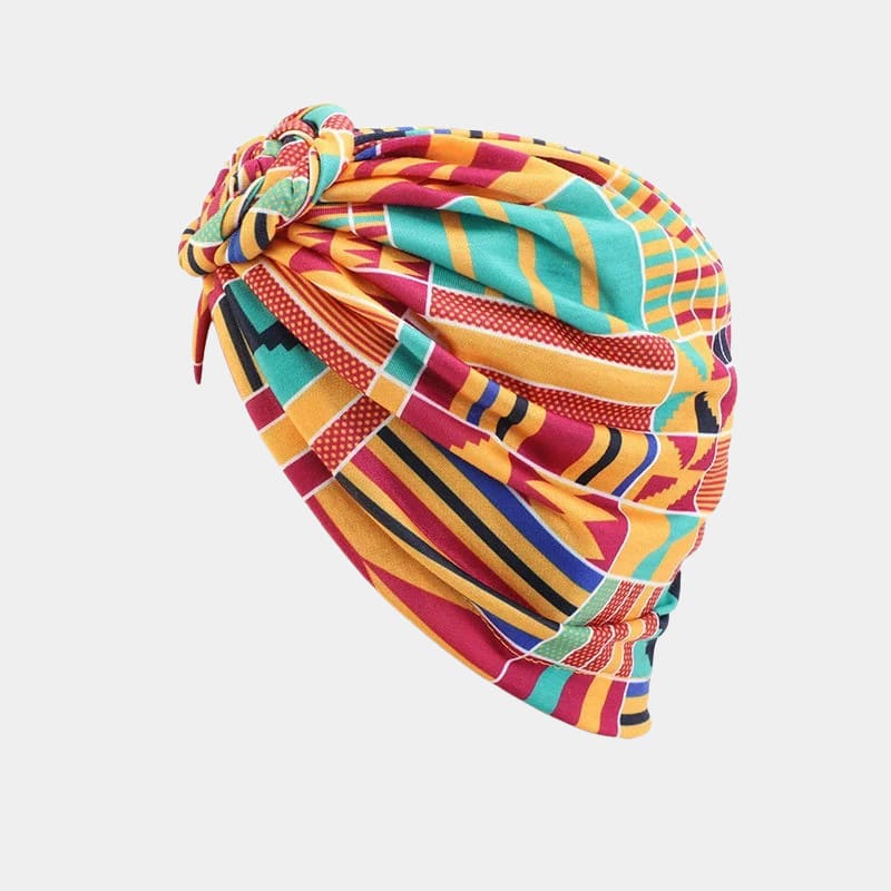 Turban motif africain orange avec nœud